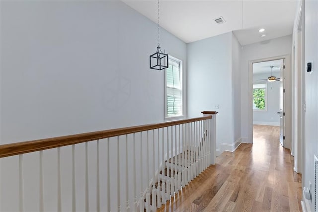 hallway featuring light hardwood / wood-style flooring