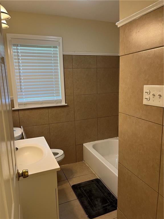 full bathroom featuring tile walls, tile patterned flooring, vanity, and toilet