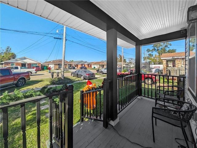 balcony featuring covered porch