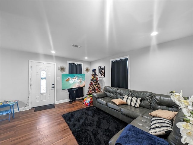 living room featuring dark hardwood / wood-style floors