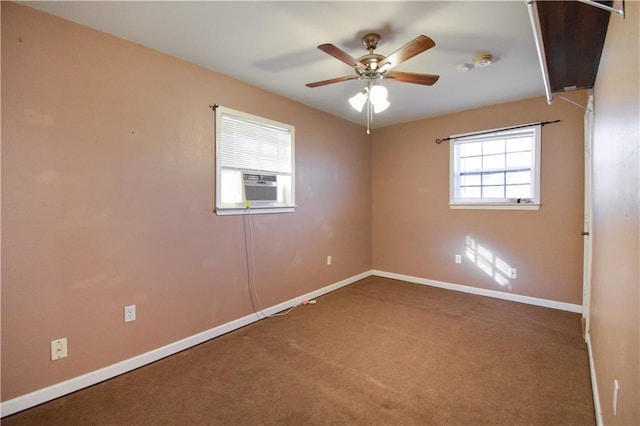 carpeted empty room with ceiling fan and cooling unit