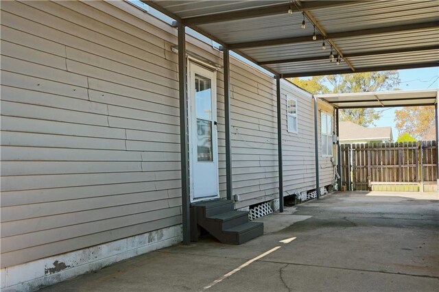 view of property exterior featuring a carport