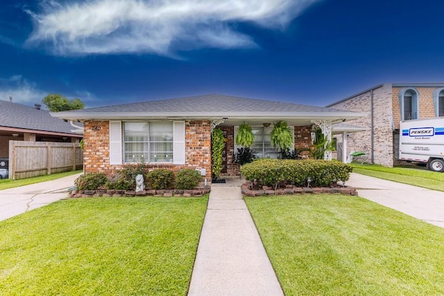 view of front of home with a front yard