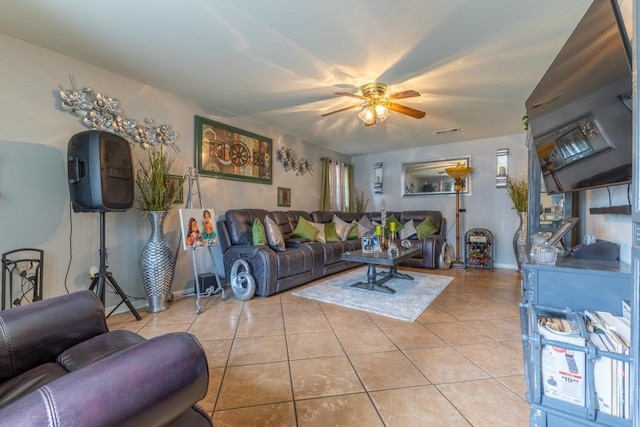 tiled living room featuring ceiling fan