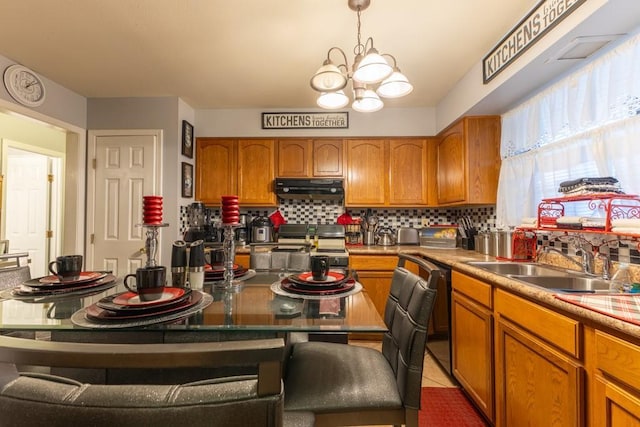 kitchen featuring decorative light fixtures, black dishwasher, sink, a chandelier, and light tile patterned floors