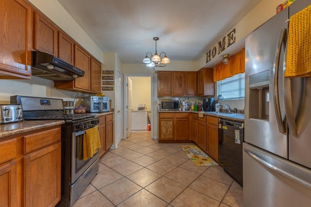 kitchen with decorative light fixtures, sink, stainless steel appliances, light tile patterned floors, and a chandelier