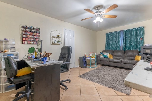 office area featuring ceiling fan and light tile patterned floors