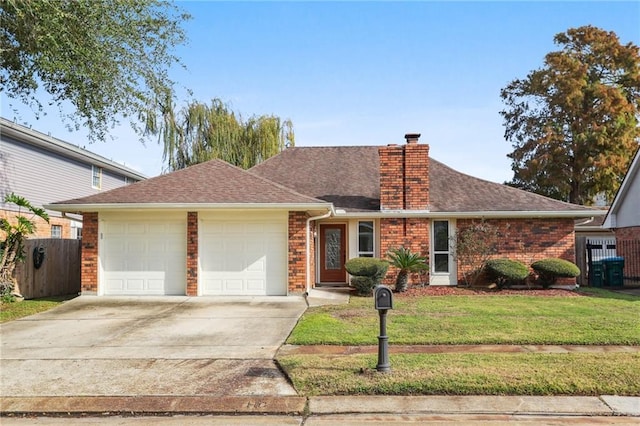 single story home featuring a garage and a front lawn