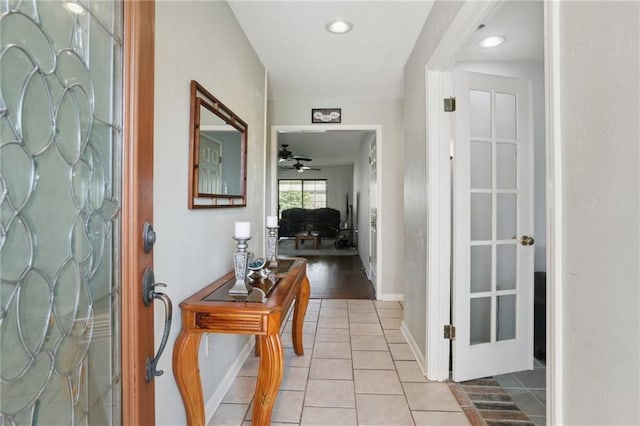 hallway with light tile patterned flooring