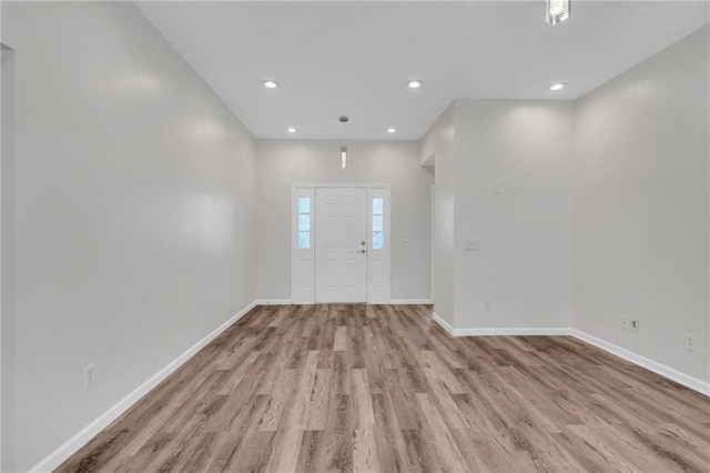 foyer with light hardwood / wood-style flooring