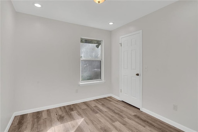 empty room with light wood-type flooring