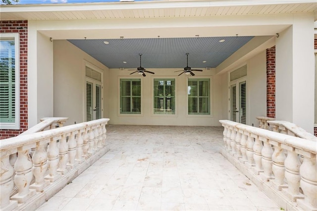 view of patio / terrace featuring ceiling fan