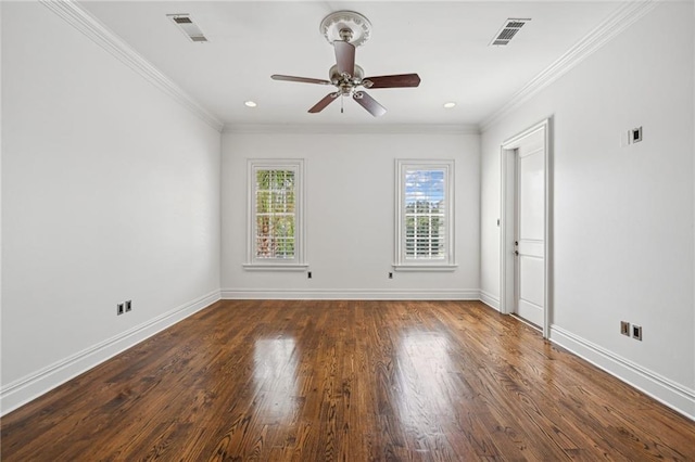 spare room featuring ceiling fan, ornamental molding, and dark hardwood / wood-style flooring