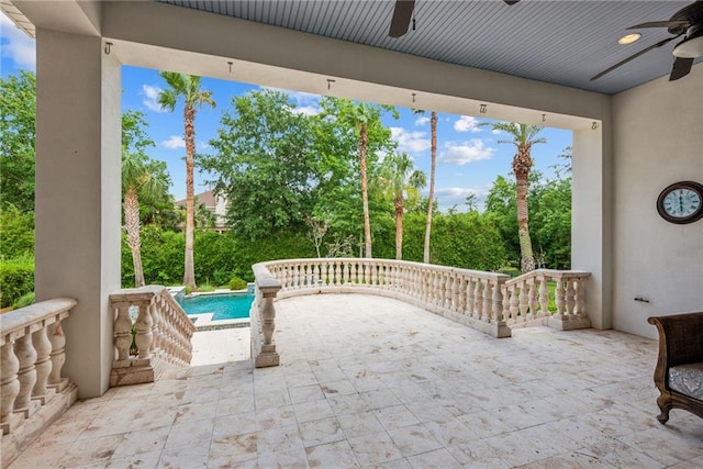 view of patio with ceiling fan