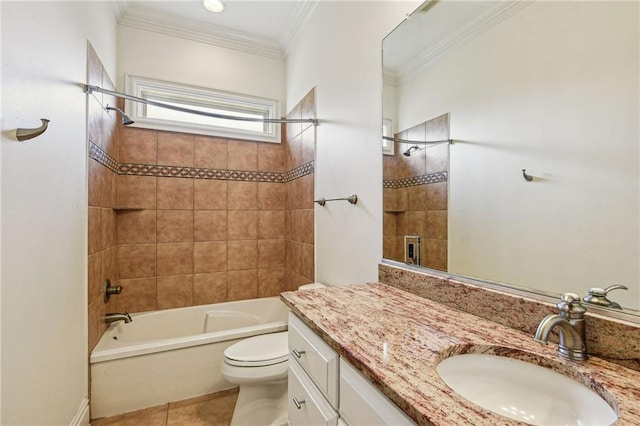 full bathroom with toilet, vanity, tile patterned floors, ornamental molding, and tiled shower / bath