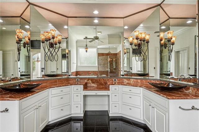 bathroom with walk in shower, vanity, ceiling fan, and crown molding