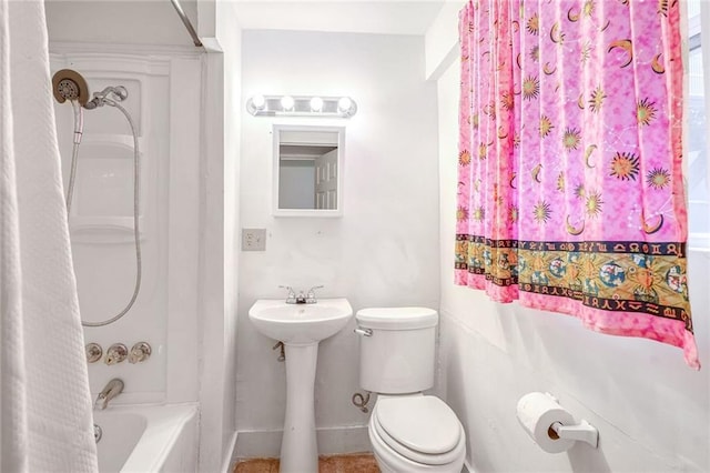 bathroom with toilet and shower / tub combo with curtain