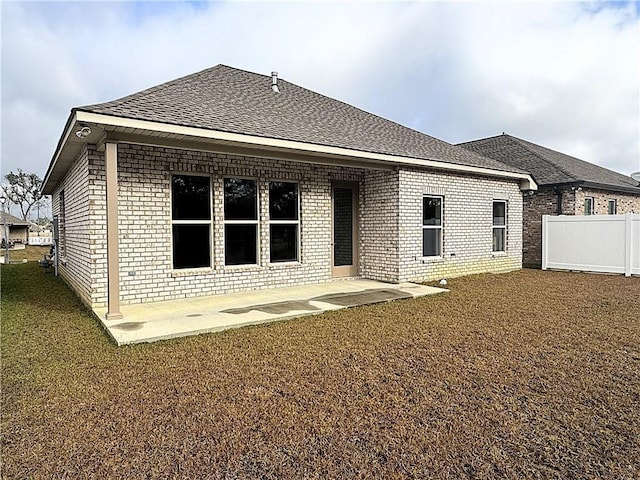 rear view of house with a patio