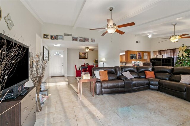 kitchen featuring tile patterned floors, sink, stainless steel dishwasher, and a textured ceiling