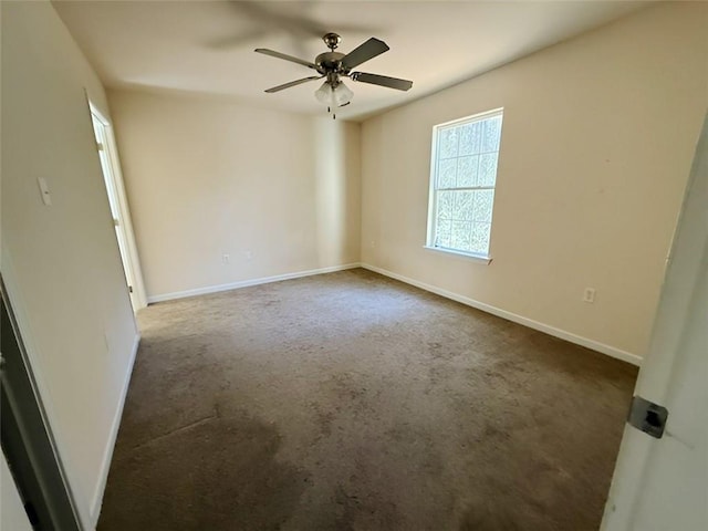 unfurnished room with ceiling fan