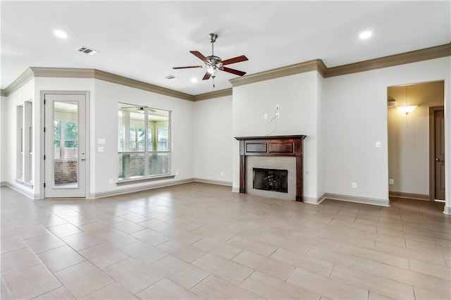 unfurnished living room with ceiling fan and ornamental molding