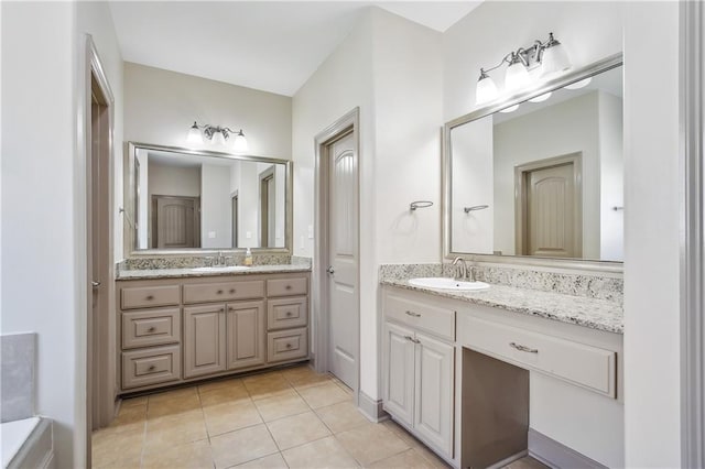 bathroom featuring tile patterned floors and vanity