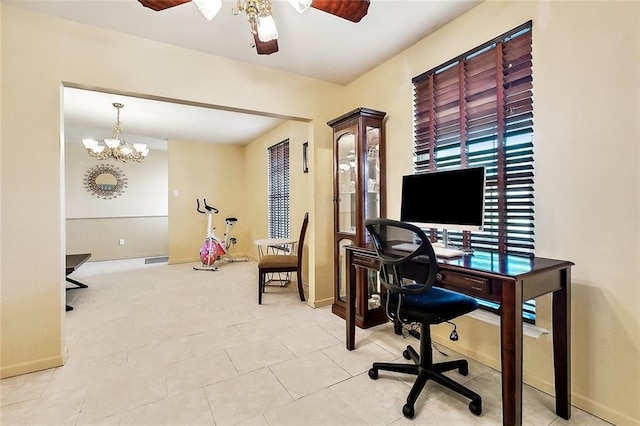 office featuring ceiling fan with notable chandelier and light tile patterned floors