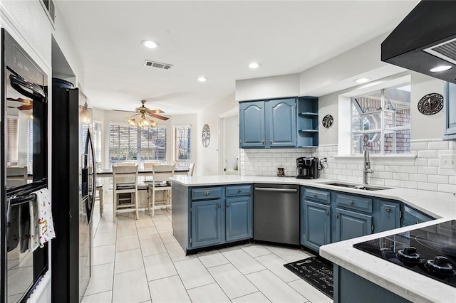 kitchen featuring ceiling fan, sink, stainless steel dishwasher, and blue cabinets