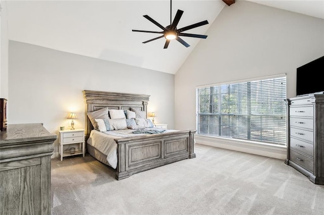 bedroom featuring carpet, ceiling fan, high vaulted ceiling, and beam ceiling