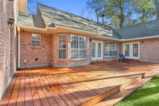 wooden deck featuring french doors