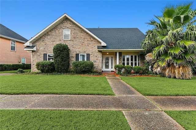 view of front facade with a front yard