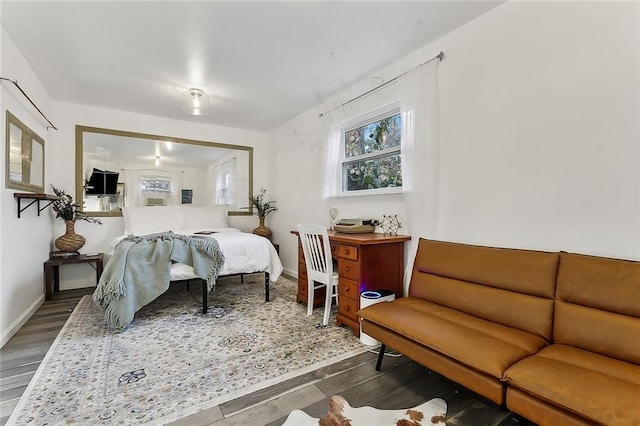 bedroom featuring dark wood-type flooring