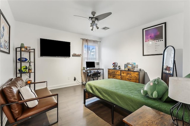 bedroom featuring wood-type flooring and ceiling fan