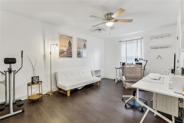 office area with ceiling fan and dark hardwood / wood-style flooring