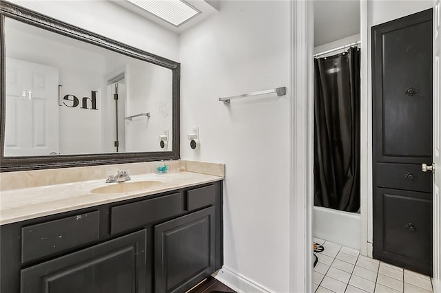 bathroom with tile patterned flooring, vanity, and shower / bathtub combination with curtain