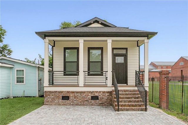 bungalow-style house featuring covered porch