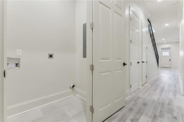 hallway with light hardwood / wood-style flooring