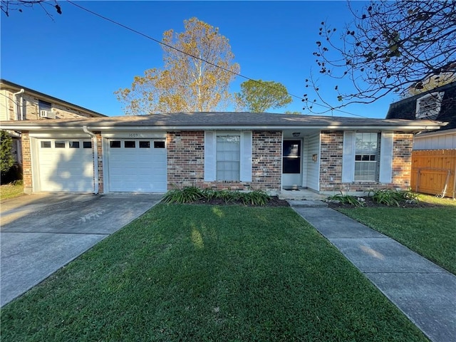 ranch-style house with a garage and a front yard