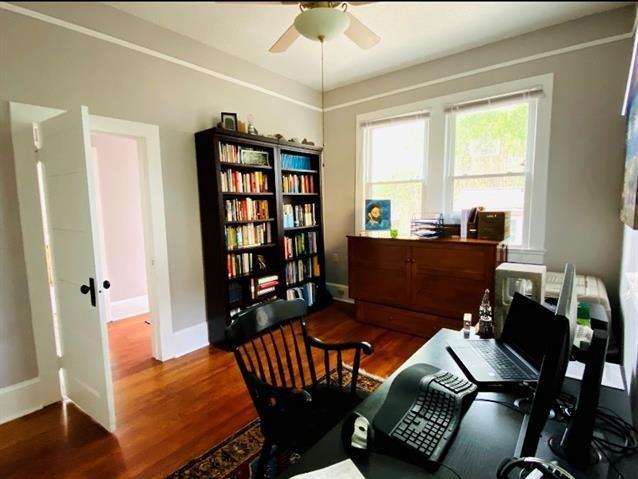 office space featuring ceiling fan and wood-type flooring