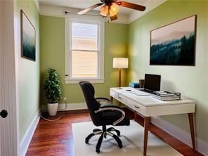 office area featuring dark hardwood / wood-style flooring and ceiling fan