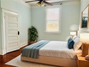 bedroom with ceiling fan, wood-type flooring, and crown molding