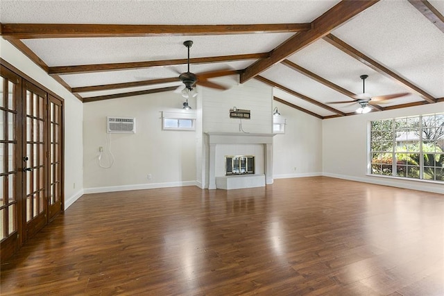 unfurnished living room with french doors, vaulted ceiling with beams, ceiling fan, a textured ceiling, and dark hardwood / wood-style flooring