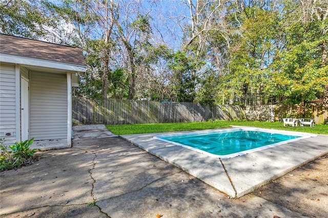 view of swimming pool with a patio area