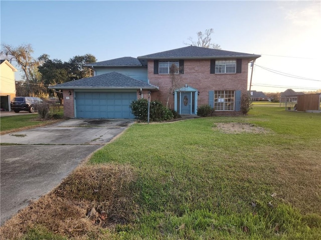 view of front facade with a front lawn and a garage