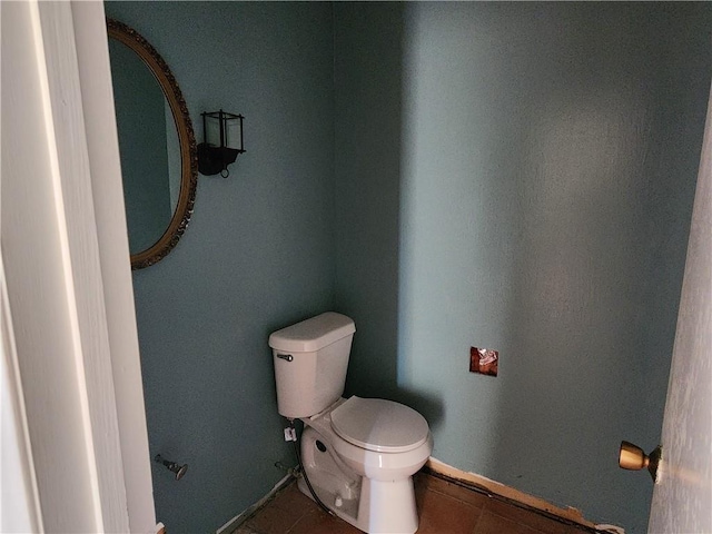 bathroom featuring tile patterned floors and toilet