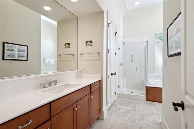 bathroom featuring shower with separate bathtub, vanity, and crown molding