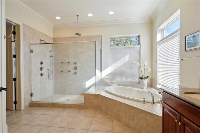 bathroom featuring tile patterned floors, vanity, ornamental molding, and independent shower and bath