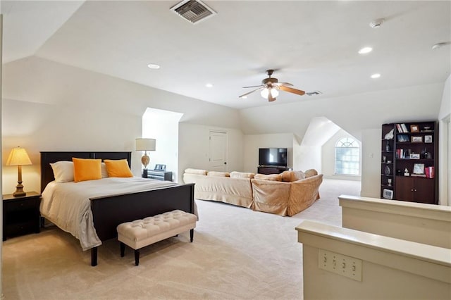 carpeted bedroom featuring ceiling fan and vaulted ceiling