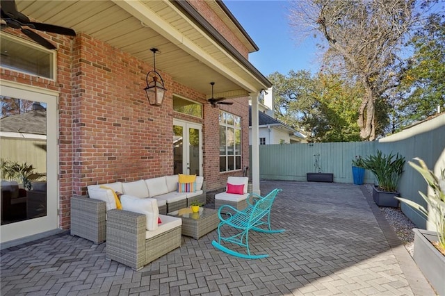 view of patio featuring an outdoor living space and ceiling fan