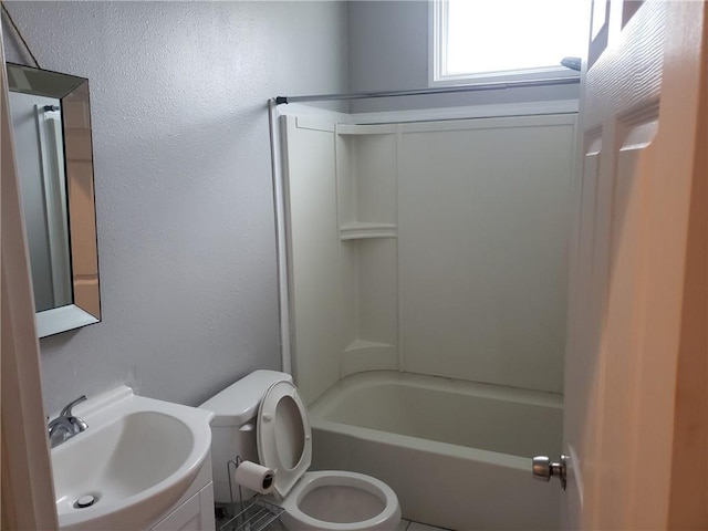 full bathroom featuring shower / bathing tub combination, vanity, and toilet